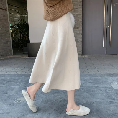 Manufacturers Knitted Half Skirt Women′s 2023 Spring New Solid Color Sweater Matching Medium Length High Waist a Word Wool Skirt
